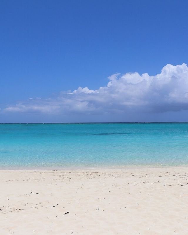 Grace Bay Beach Facing North With Clouds In the Distance